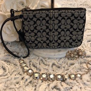 Black and Gray Coach Wristlet